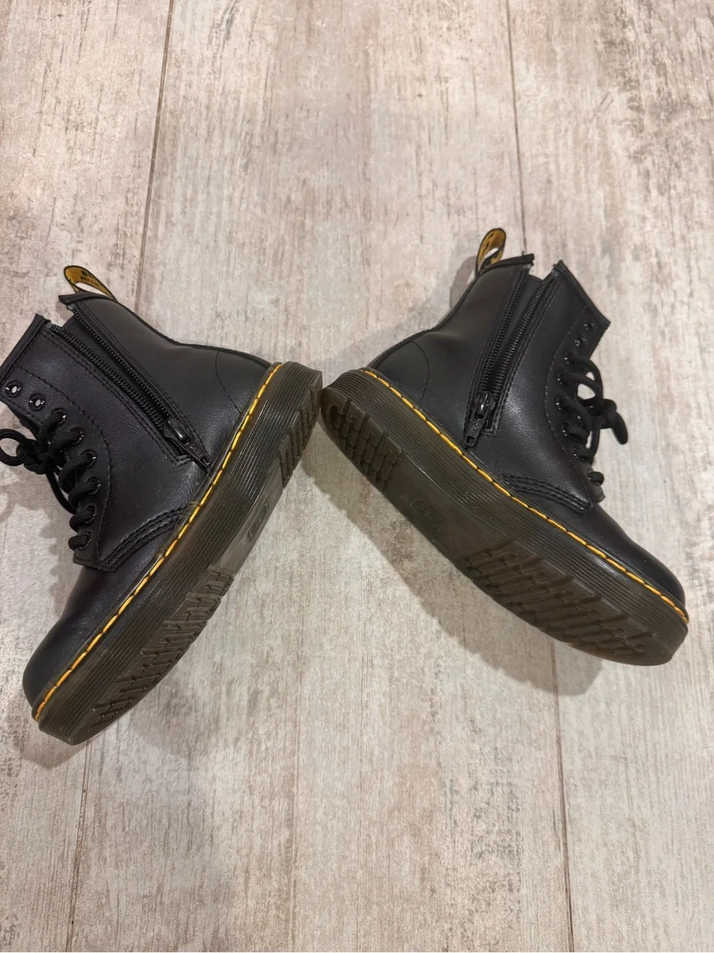Dr. Martens Black Leather Kids Lace-Up Boots with Yellow Stitching